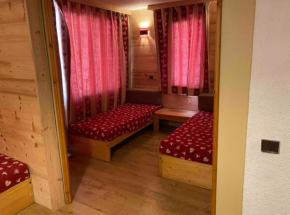 Appartement aux Coches skis aux pieds